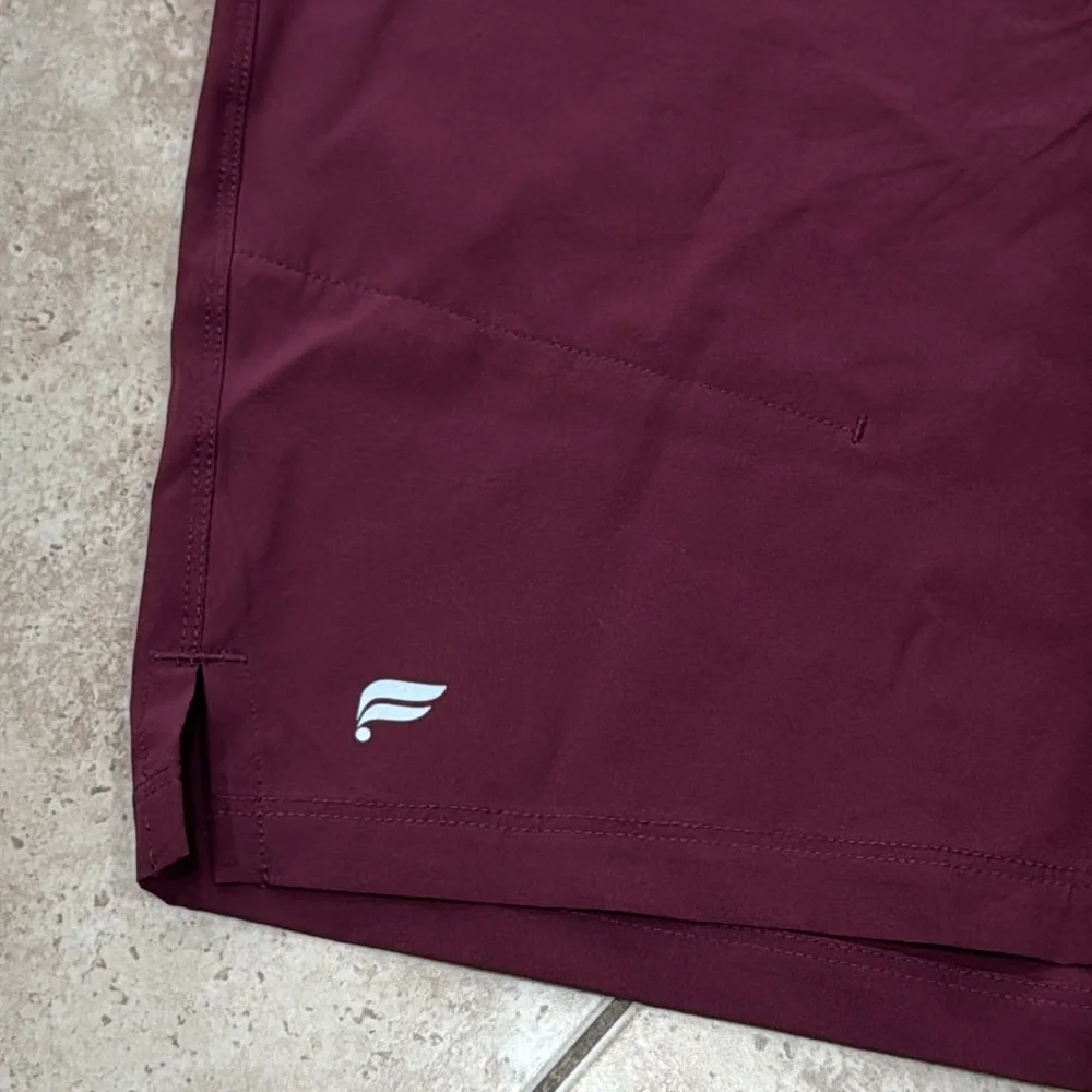 Fabletics Men's Burgundy Athletic 7 inch Shorts with Lavender Waistband NWT - Picture 4 of 11